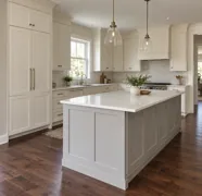 Illustrative cream kitchen with a pale gray island